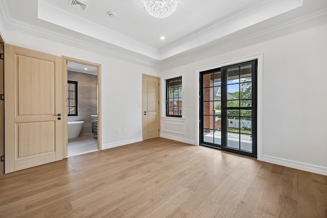 35-26 221st St, Bayside, NY 11361 - spare room with light wood finished floors, a raised ceiling, a chandelier, crown molding, and recessed lighting