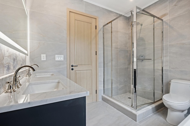 35-26 221st St, Bayside, NY 11361 - bathroom featuring tile walls, double vanity, a shower stall, and marble finish flooring