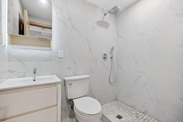 35-26 221st St, Bayside, NY 11361 - bathroom with vanity, a marble finish shower, and tile walls