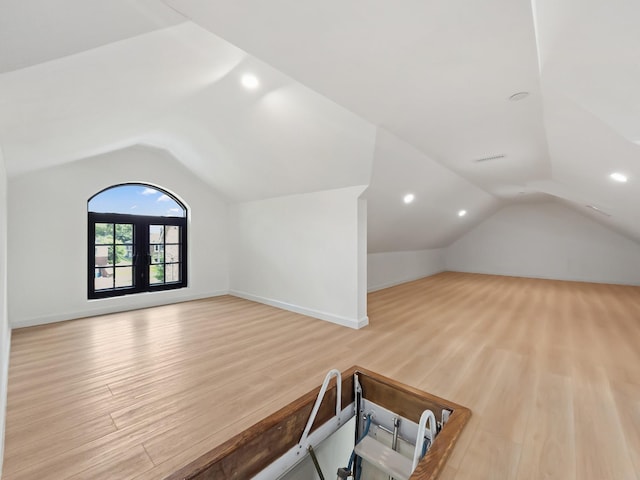 35-26 221st St, Bayside, NY 11361 - bonus room with lofted ceiling, wood finished floors, and recessed lighting