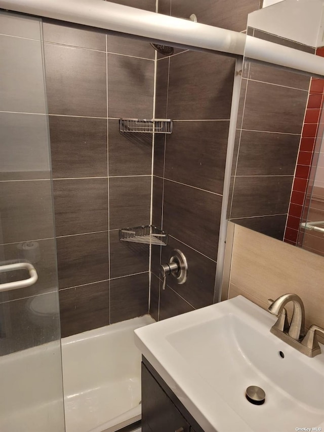 118-17 Union Tpke Unit 14E, Forest Hills, NY 11375 - bathroom with vanity and bathing tub / shower combination