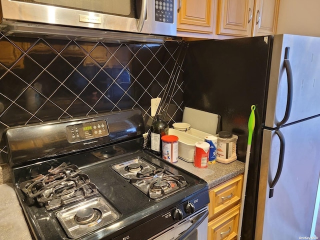 118-17 Union Tpke Unit 14E, Forest Hills, NY 11375 - kitchen featuring stainless steel appliances and tasteful backsplash