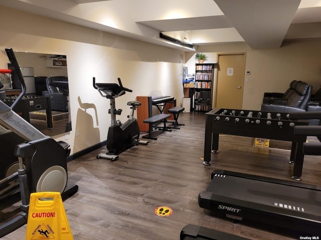 118-17 Union Tpke Unit 14E, Forest Hills, NY 11375 - exercise room featuring wood finished floors and baseboards