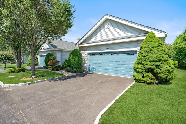575 Mirror Pond Ct, Moriches, NY 11955 - ranch-style home featuring driveway, a front lawn, and stone siding
