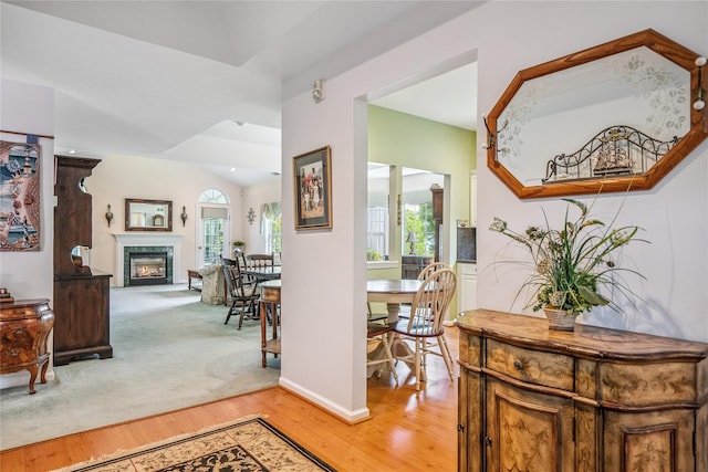 575 Mirror Pond Ct, Moriches, NY 11955 - hallway featuring light wood-style flooring and baseboards