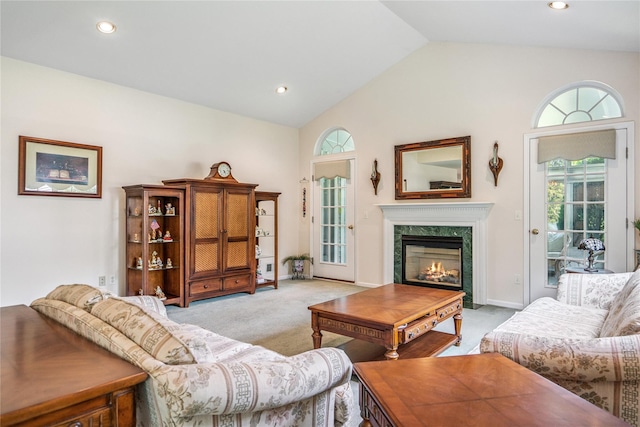 575 Mirror Pond Ct, Moriches, NY 11955 - living room featuring light colored carpet, a premium fireplace, recessed lighting, and high vaulted ceiling