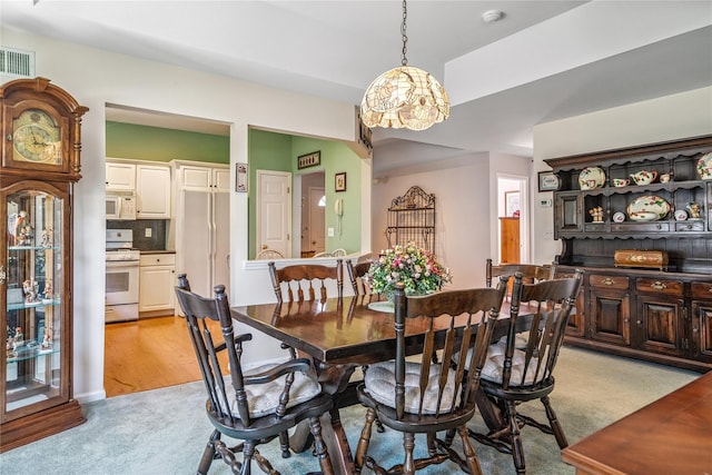 575 Mirror Pond Ct, Moriches, NY 11955 - dining area featuring light carpet