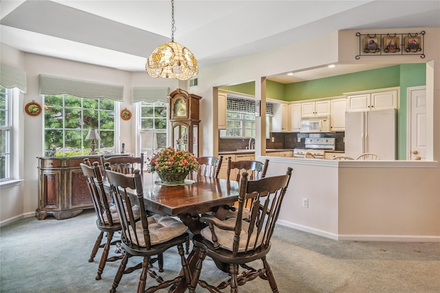 575 Mirror Pond Ct, Moriches, NY 11955 - dining area with light colored carpet, plenty of natural light, and recessed lighting