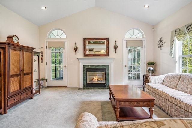 575 Mirror Pond Ct, Moriches, NY 11955 - living room featuring lofted ceiling, carpet floors, a high end fireplace, and recessed lighting