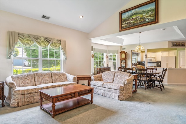 575 Mirror Pond Ct, Moriches, NY 11955 - living room featuring light colored carpet, lofted ceiling, and recessed lighting