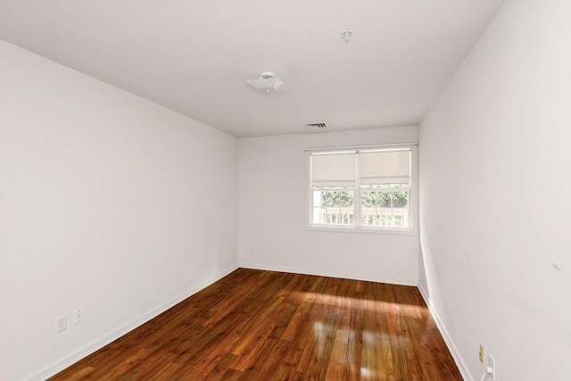 117 Willow Ln, Valley Stream, NY 11580 - spare room featuring hardwood / wood-style flooring and baseboards