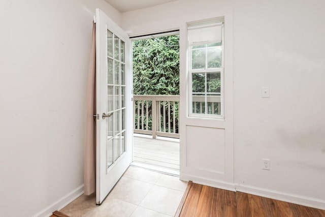 117 Willow Ln, Valley Stream, NY 11580 - entryway with baseboards and light tile patterned floors