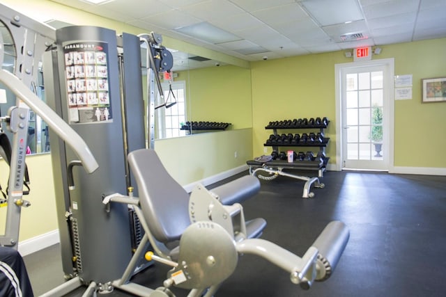 117 Willow Ln, Valley Stream, NY 11580 - exercise room featuring baseboards and a drop ceiling