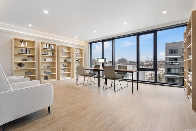 14-54 31st Ave Unit 3A, Astoria, NY 11106 - office space with wood finished floors, floor to ceiling windows, recessed lighting, and a city view