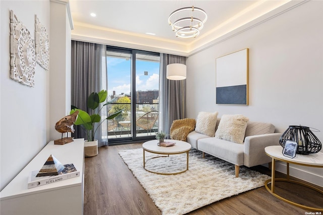 14-54 31st Ave Unit 3A, Astoria, NY 11106 - living room with wood finished floors, a chandelier, and recessed lighting