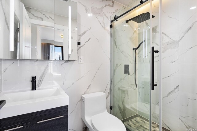 14-54 31st Ave Unit 3A, Astoria, NY 11106 - full bath with tile walls, a marble finish shower, and vanity