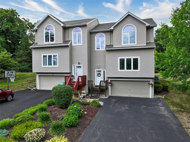 2 Riverstone Ct, Highland Mills, NY 10930 - view of front of property featuring a garage, asphalt driveway, and roof with shingles