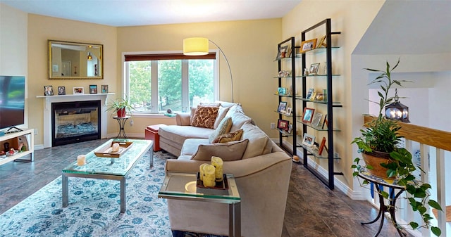 2 Riverstone Ct, Highland Mills, NY 10930 - living area featuring dark stone finish floors and a glass covered fireplace