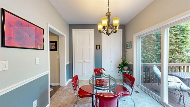 2 Riverstone Ct, Highland Mills, NY 10930 - dining area featuring a chandelier and baseboards