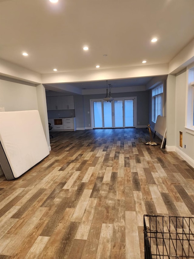 7 E Blvd, East Rockaway, NY 11518 - unfurnished living room featuring wood finished floors and recessed lighting