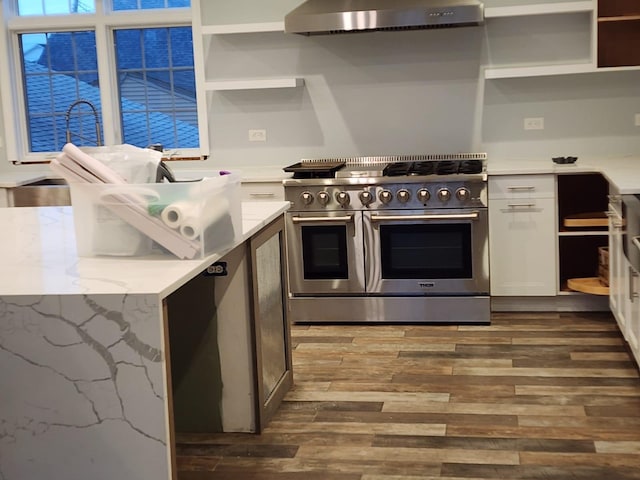 7 E Blvd, East Rockaway, NY 11518 - kitchen featuring open shelves, range with two ovens, range hood, and wood finished floors