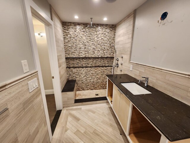 7 E Blvd, East Rockaway, NY 11518 - full bathroom with walk in shower, tile walls, vanity, and recessed lighting