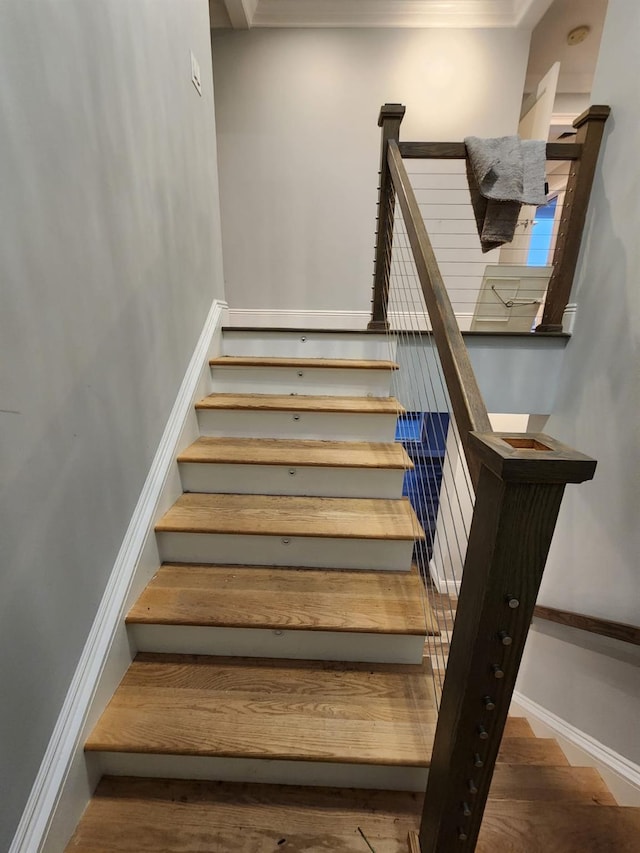 7 E Blvd, East Rockaway, NY 11518 - stairs featuring wood finished floors and baseboards