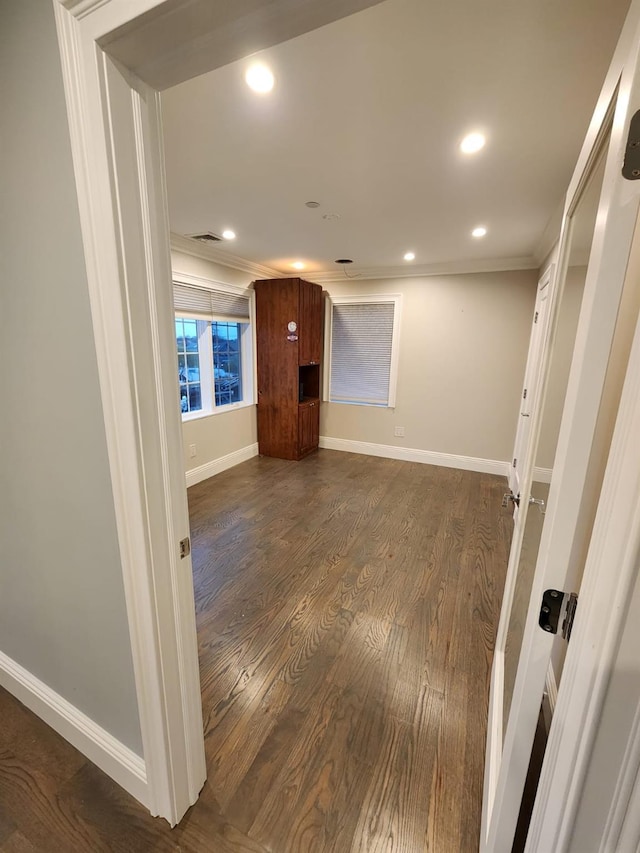 7 E Blvd, East Rockaway, NY 11518 - unfurnished room featuring ornamental molding, dark wood-type flooring, and recessed lighting