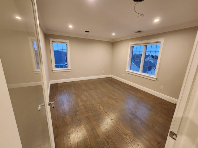 7 E Blvd, East Rockaway, NY 11518 - empty room with ornamental molding, dark wood-type flooring, and recessed lighting