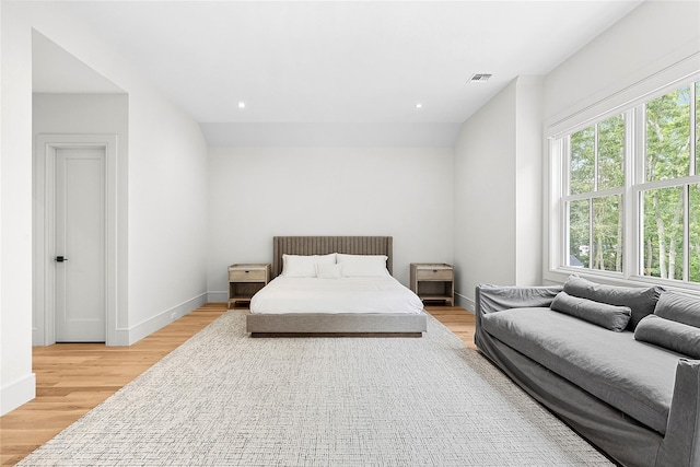 2 Herrick Ln, Southampton, NY 11968 - bedroom with light wood-style flooring and recessed lighting