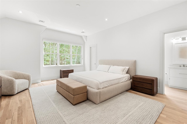 2 Herrick Ln, Southampton, NY 11968 - bedroom with light wood-style flooring, recessed lighting, and vaulted ceiling
