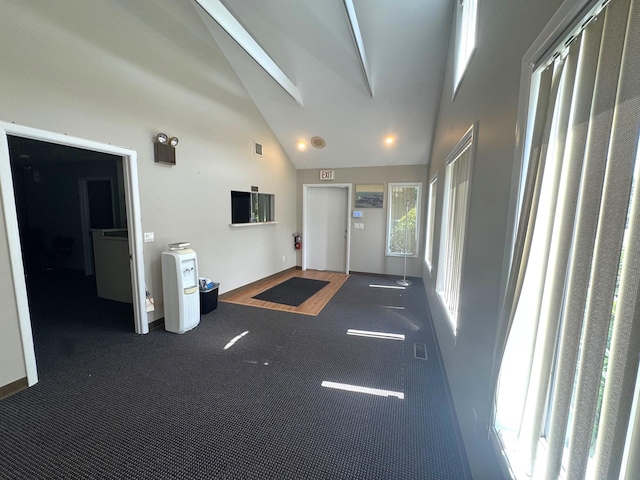 interior space featuring vaulted ceiling
