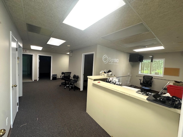 welcome area with a drop ceiling