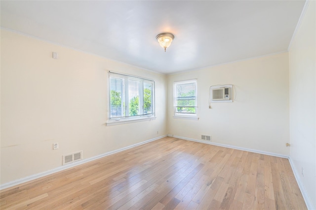 16346 21st Rd, Whitestone, NY 11357 - unfurnished room with light wood-style floors, crown molding, and an AC wall unit