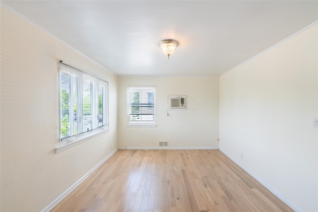 16346 21st Rd, Whitestone, NY 11357 - empty room with crown molding, light wood-type flooring, and a wall mounted AC