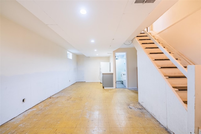 16346 21st Rd, Whitestone, NY 11357 - below grade area featuring stairway, recessed lighting, and freestanding refrigerator