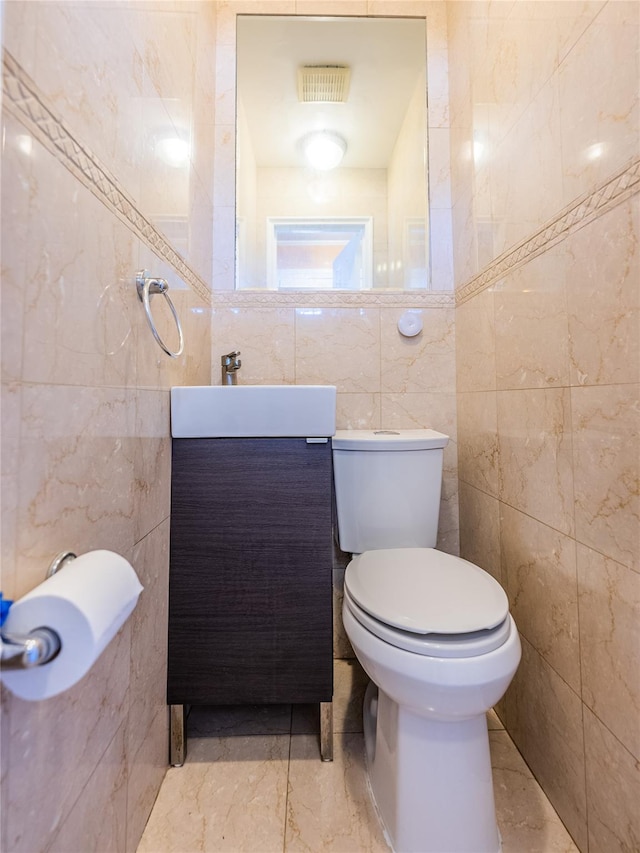 16346 21st Rd, Whitestone, NY 11357 - half bath with tile walls, vanity, and marble finish floors