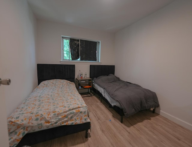 2725 E 65th St, Brooklyn, NY 11234 - bedroom featuring light wood-style flooring and baseboards