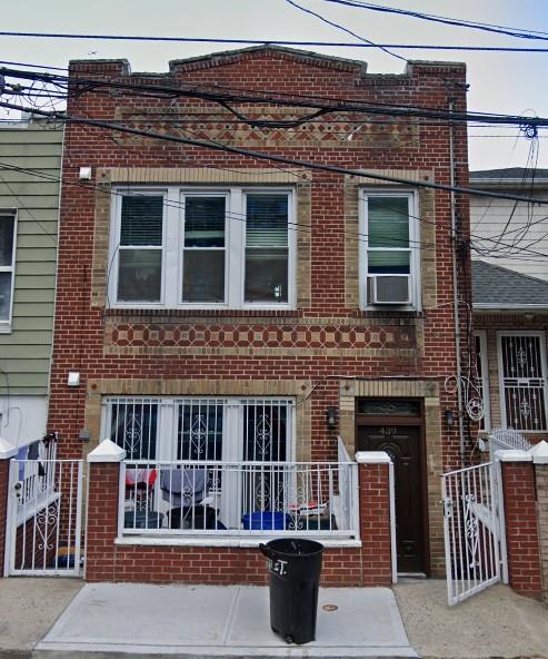 439 Forbell, Brooklyn, NY 11208 - view of front of home with brick siding