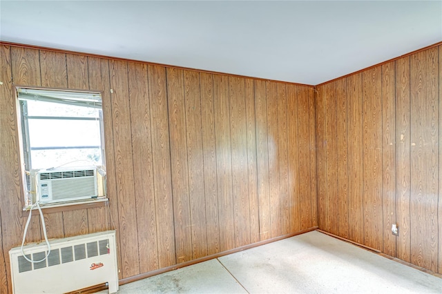 1435 Peters Blvd, Bay Shore, NY 11706 - empty room with radiator, carpet, and wooden walls