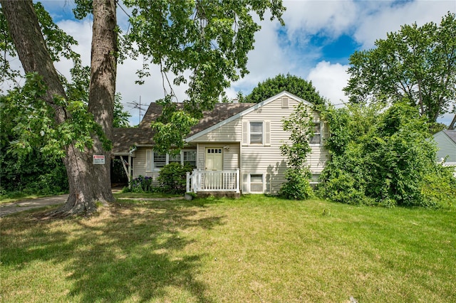 1435 Peters Blvd, Bay Shore, NY 11706 - rear view of property with a yard