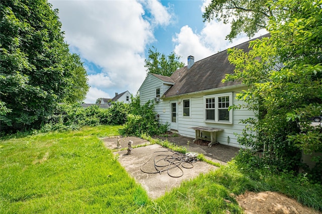 1435 Peters Blvd, Bay Shore, NY 11706 - view of green lawn with a patio