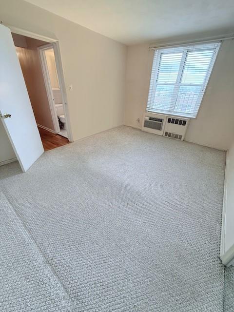 210-15 23rd Ave Unit 4E, Bayside, NY 11360 - view of carpeted empty room