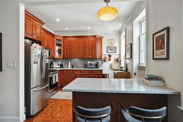 228 Pacific St, Brooklyn, NY 11201 - kitchen with appliances with stainless steel finishes, a peninsula, a breakfast bar area, light stone countertops, and glass insert cabinets