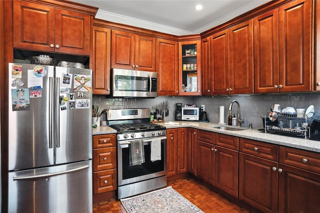 228 Pacific St, Brooklyn, NY 11201 - kitchen with appliances with stainless steel finishes, light stone counters, tasteful backsplash, and ornamental molding