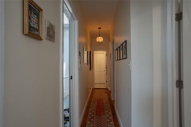 228 Pacific St, Brooklyn, NY 11201 - hallway featuring a chandelier and baseboards