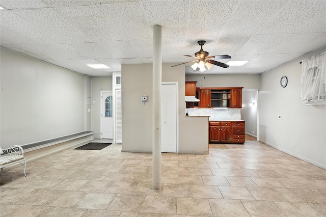 228 Pacific St, Brooklyn, NY 11201 - kitchen featuring open shelves, backsplash, ceiling fan, and light countertops