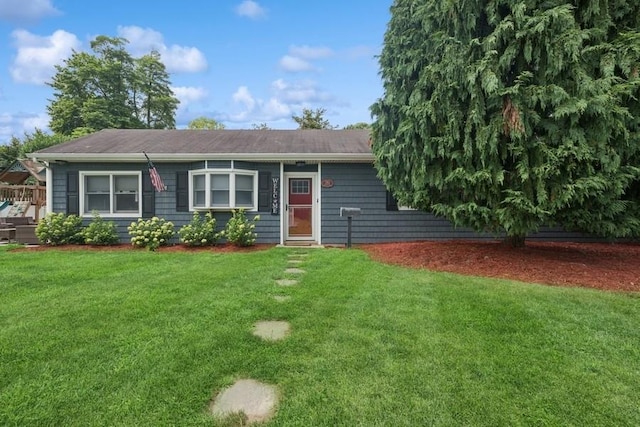 76 Cadman Ave, Babylon, NY 11702 - view of front facade with a front lawn