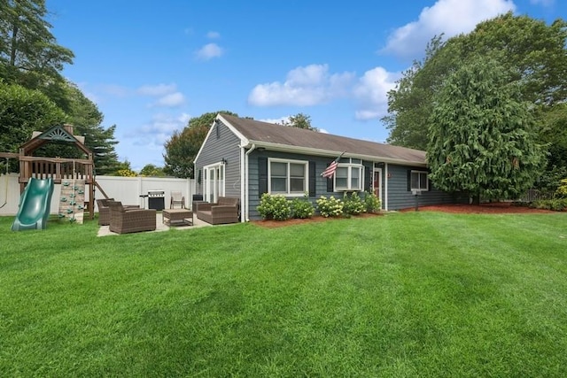 76 Cadman Ave, Babylon, NY 11702 - rear view of property featuring outdoor lounge area and a playground