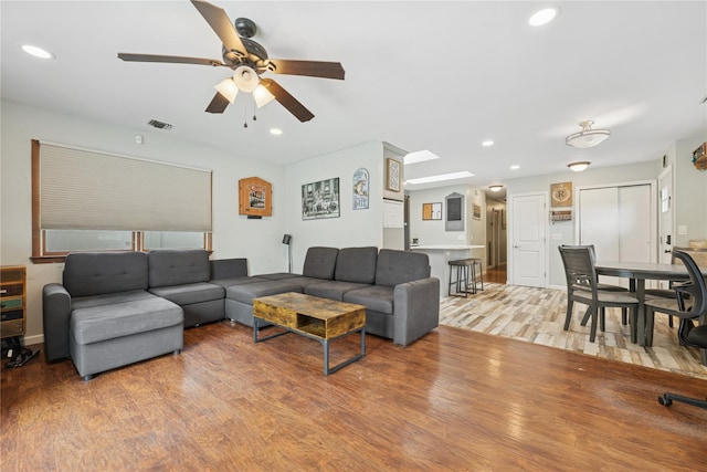 76 Cadman Ave, Babylon, NY 11702 - living room with a ceiling fan, light wood-type flooring, and recessed lighting